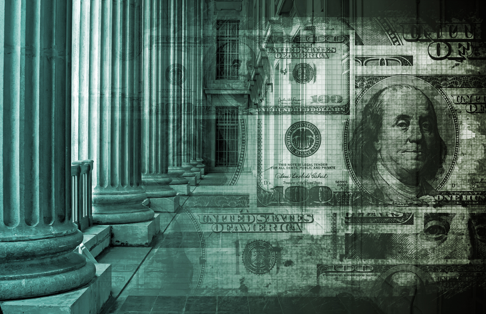 Pillars of Banking as seen on wall street with 100 dollar bill filtered into background